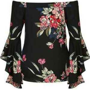 City chic off shoulder floral print top